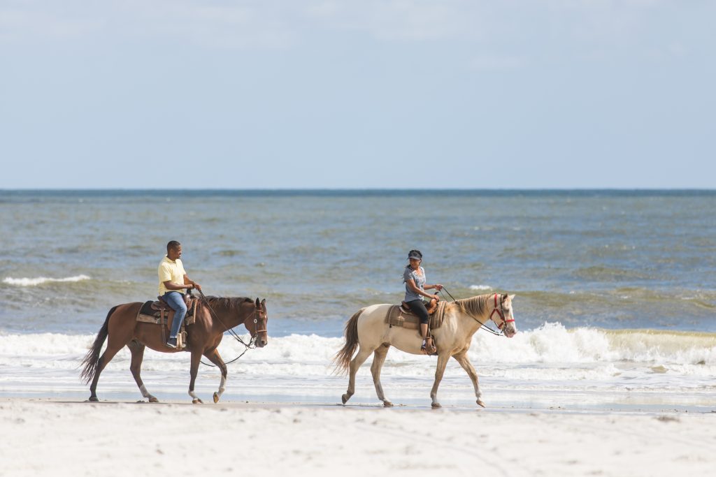 Horseback riding on the beach